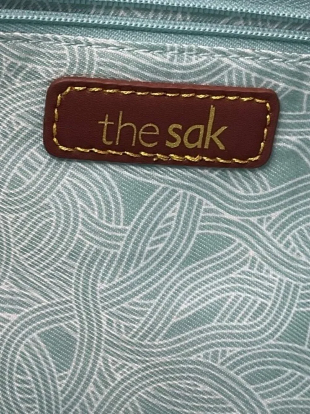 The Sak Leather Hobo Indio Floral Tooled Slouchy Tan Shoulder Bag Tassel Charm